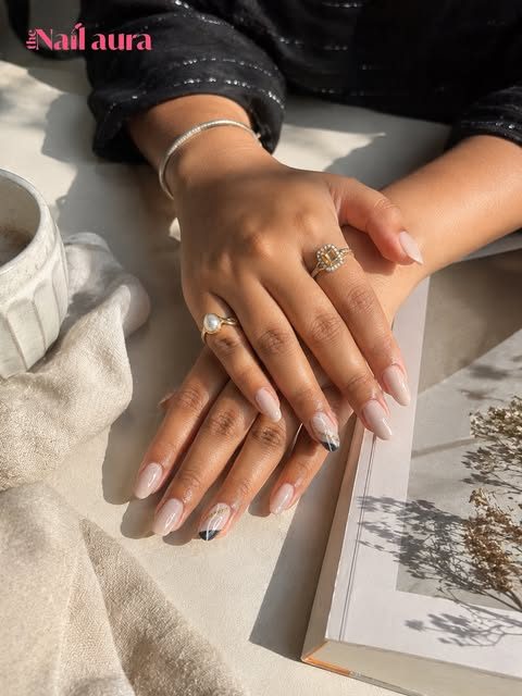 Milky nude almond nails with fine art