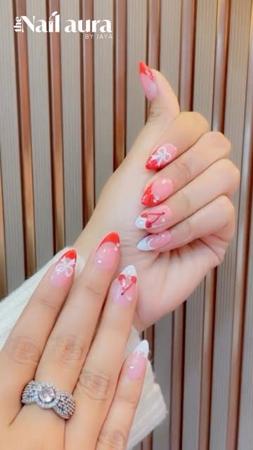 Red French tips with heart accents